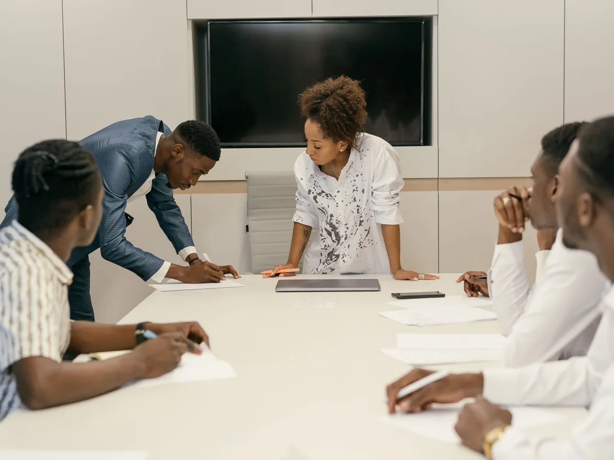 A team meeting around a boardroom table